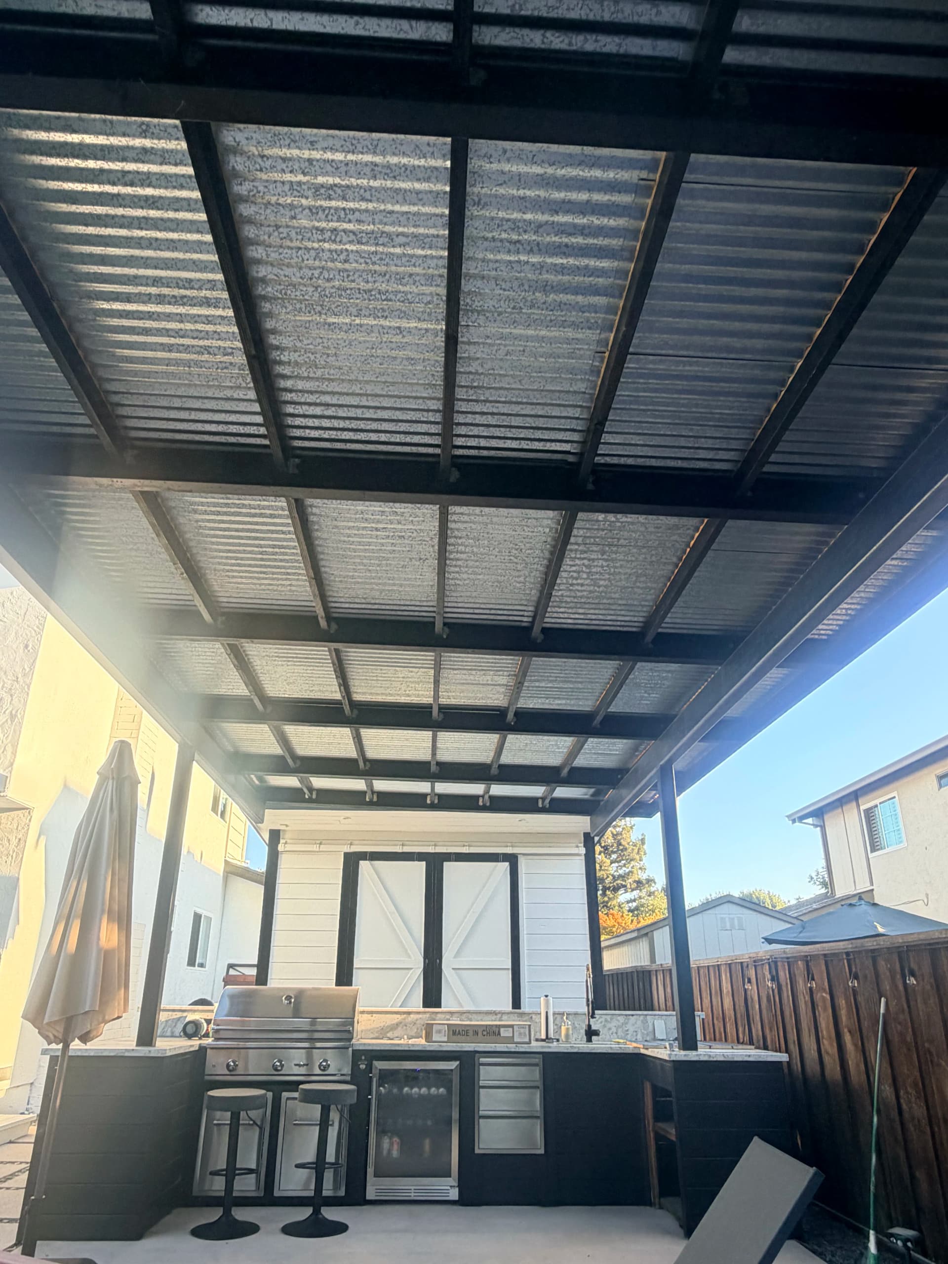 Gazebo BBQ Space Gets a Ceiling Fan, Lighting, and TV Outlet image